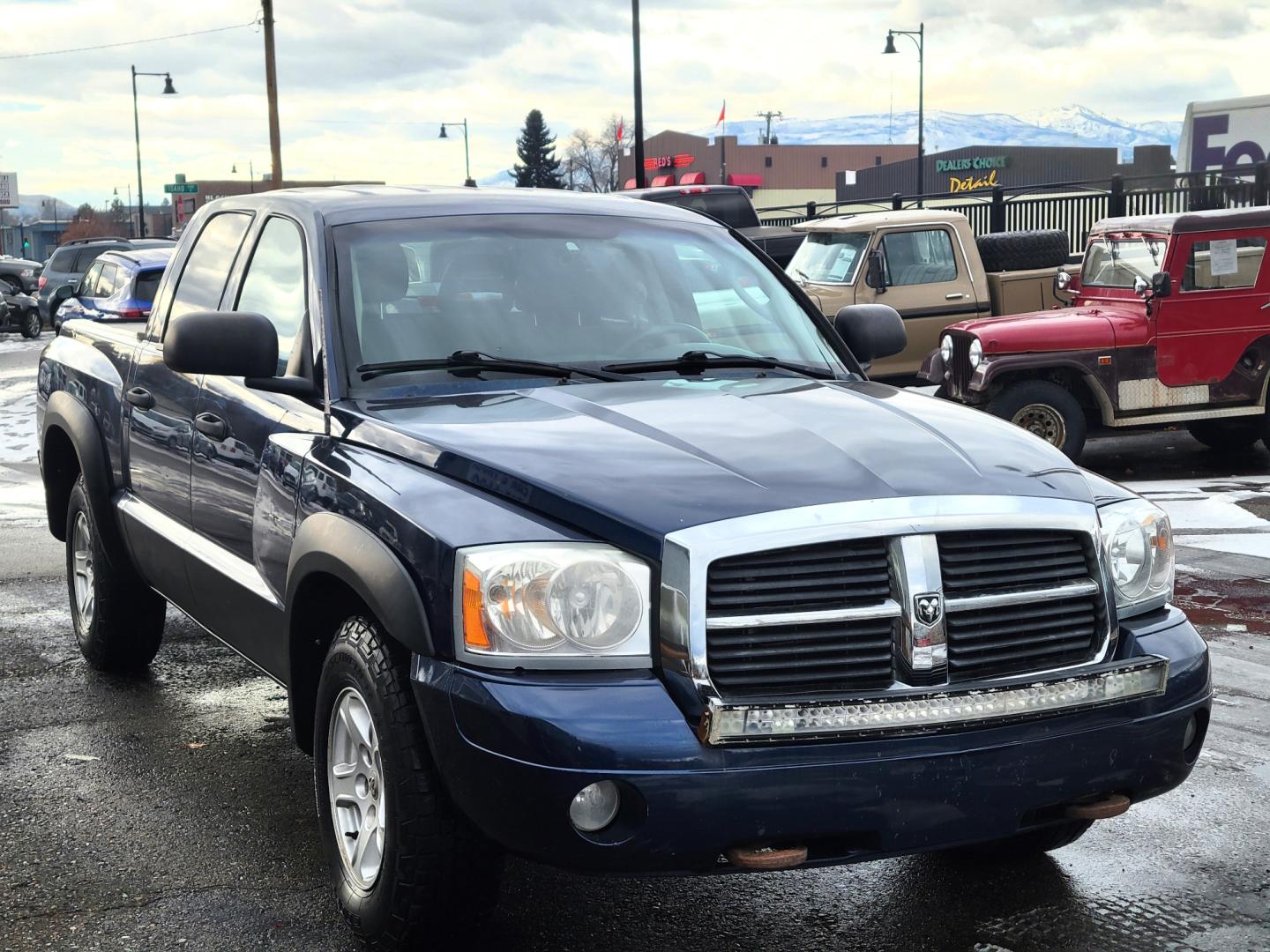 2006 Blue /Tan Dodge Dakota (1D7HW48N26S) with an 4.7L V8 engine, Automatic transmission, located at 450 N Russell, Missoula, MT, 59801, (406) 543-6600, 46.874496, -114.017433 - Great Running 4 Wheel Drive. Air. Cruise. Tilt. Power Windows and Locks. Power Drivers Seat. Newer Tires. Hard Cover over the Bed. - Photo#3